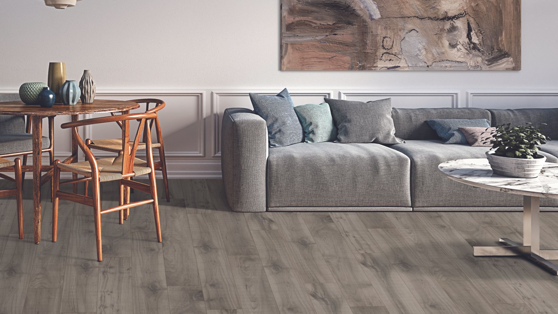 Grey hardwood flooring in a living room.